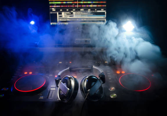 A dj deck with a pair of headphones on it